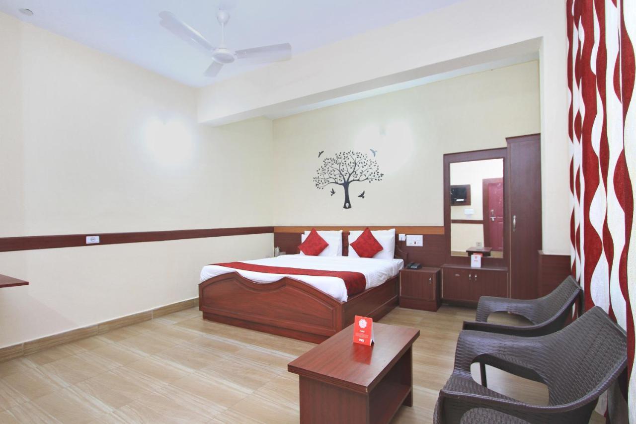 OYO 3009 Coorg Mandarin Hotel Madikeri Bagian luar foto